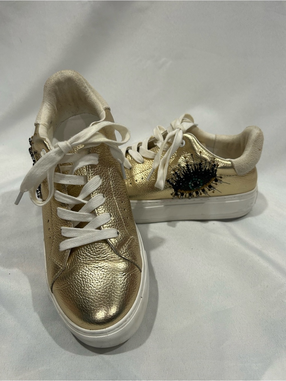 Kurt Geiger London Laney Gold Metallic Sneakers with Embellished Eye